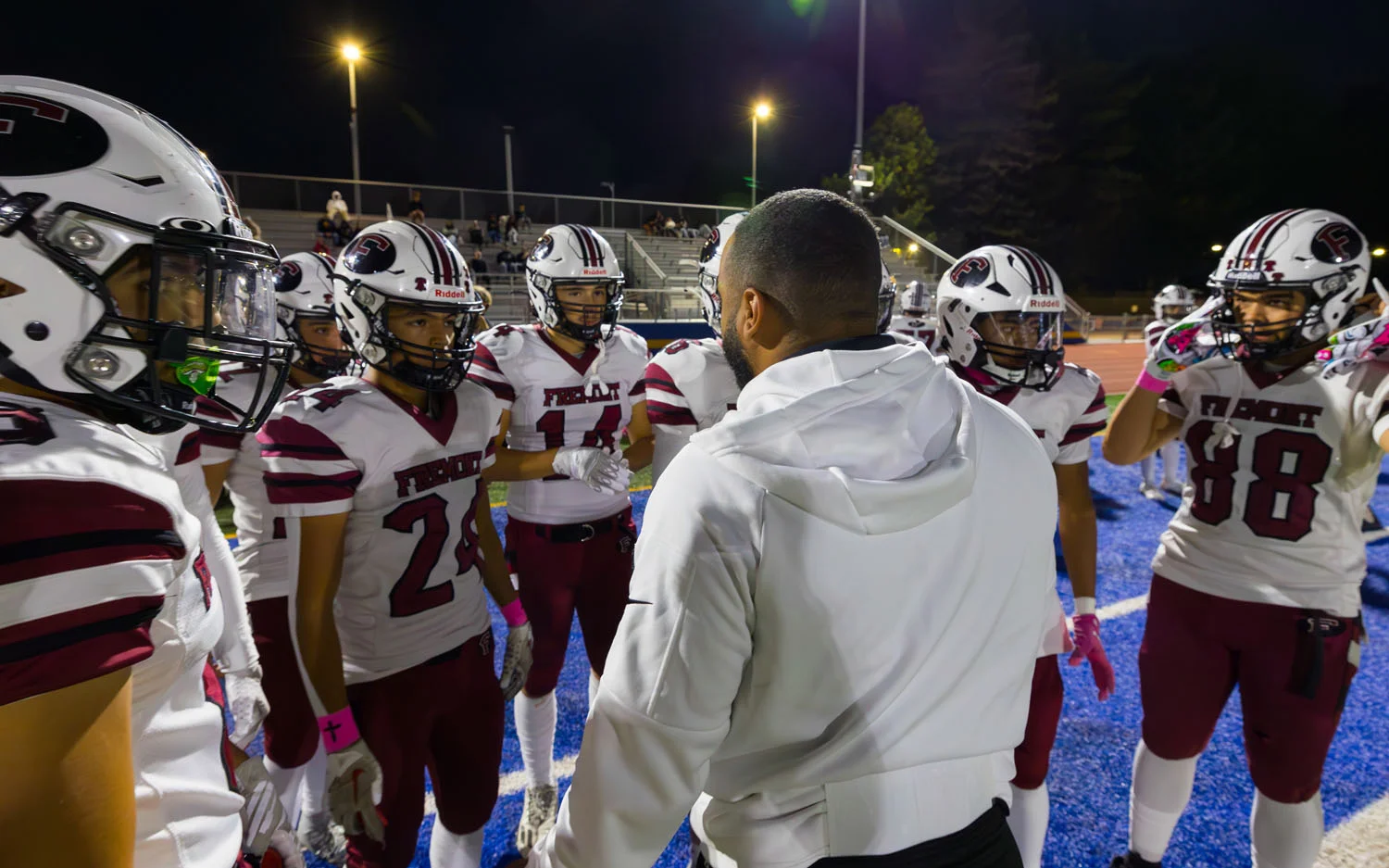 Coach talking to the team