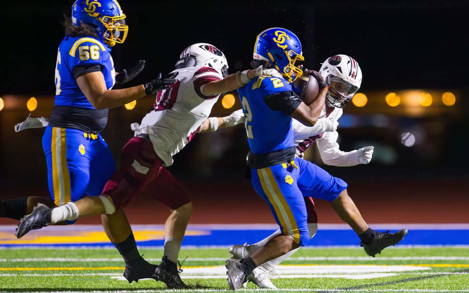 Fremont defenders making the tackle